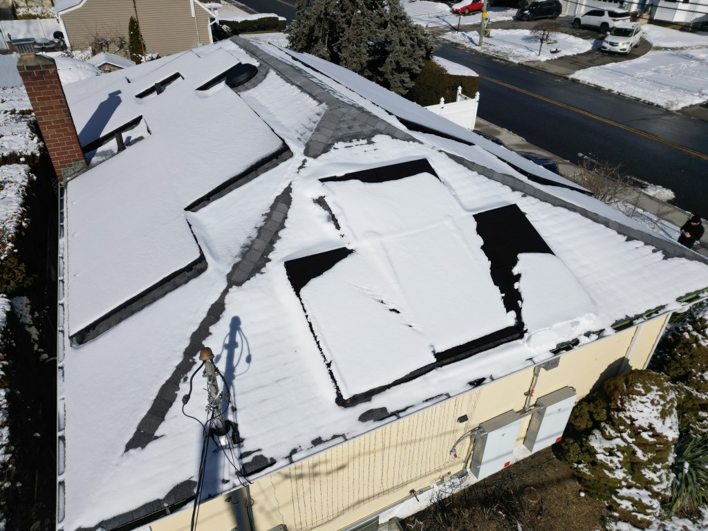 Panels covered in snow